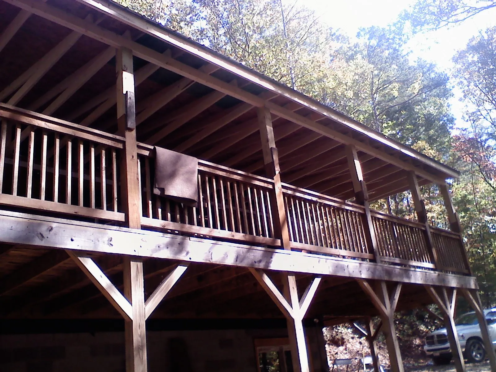 Timber framing under a new elevated porch and deck — Roof Leak Repair in Brookline by Roofing Brothers